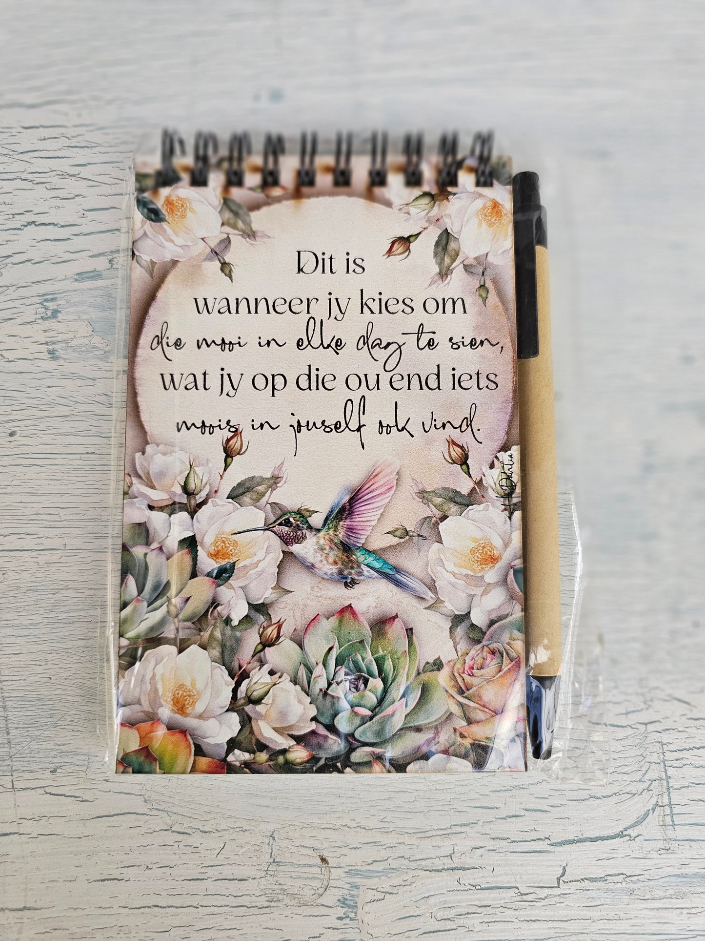 small note book with pen