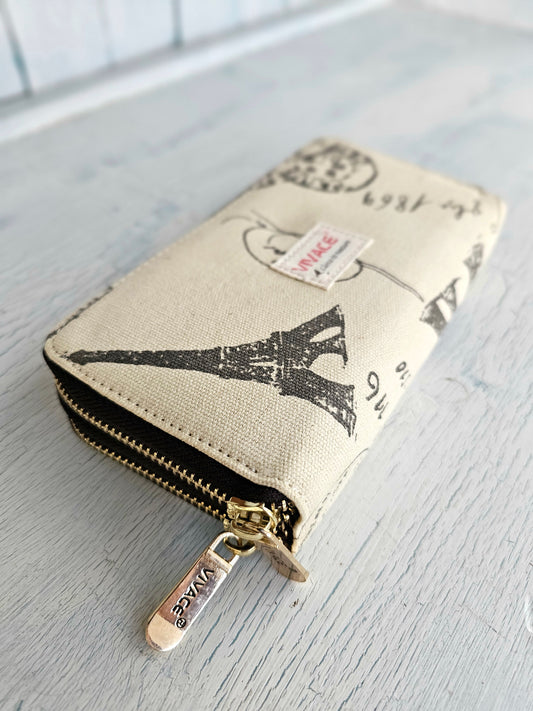 Tan colored wallet, double zip