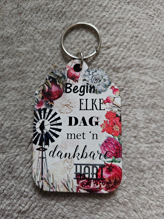 Begin elke dag keyring